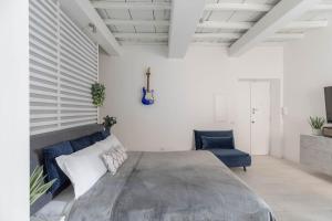 A bed or beds in a room at iFlat The G Flat
