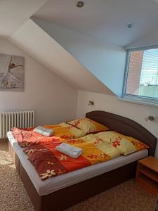 Katil atau katil-katil dalam bilik di Apartmán Zlatá rybka