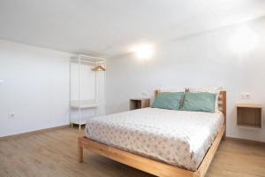 Posteľ alebo postele v izbe v ubytovaní Casa la Yeguada