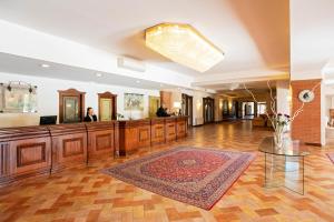 Vstupní hala nebo recepce v ubytování Fattoria La Principina Hotel & Congress