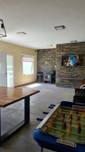 a room with a table and a table and a table sidx sidx sidx at Villa Albertina HOUSE-Villa María in Villa María