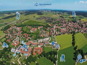 an aerial view of a city with buildings and arrows at Holzhammer Hof in Bayerbach