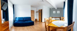 Posedenie v ubytovaní Maya Pokoje i Apartamenty