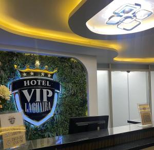 a hotel vip lobby with a sign on the wall at Hotel Vip La Guaira in Macuto +84 photos