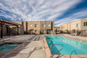 an image of a swimming pool at a apartment complex at Entrada at Moab 594 in Moab