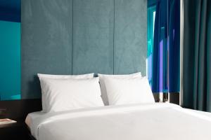 Postelja oz. postelje v sobi nastanitve Dion Luxury Suites