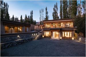 an exterior view of a house with lights at essence AT LADAKH in Leh