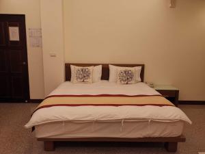 Postel nebo postele na pokoji v ubytování Mu Xi Ocean View B&B