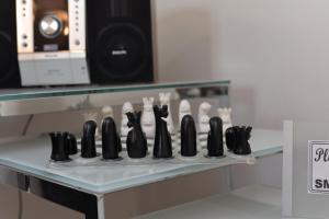a row of black bottles on a counter top at Casa Marcone in Deiva Marina