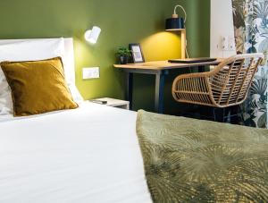 Twenty Business Flats Asnières-sur-Seine tesisinde bir odada yatak veya yataklar