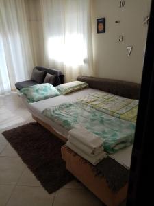 Posteľ alebo postele v izbe v ubytovaní Apartment by the Beach + 37 fotografií