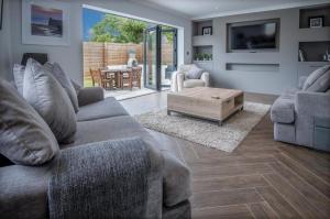 Posezení v ubytování Gower View - 4 Bedroom Luxurious Holiday Home - Saundersfoot