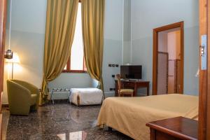 A bed or beds in a room at Le Stanze Del Vicerè Boutique Hotel Még 37 kép