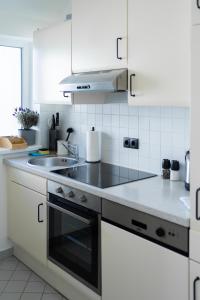 Η κουζίνα ή μικρή κουζίνα στο MyFlat - Bright Apartment near Central Station