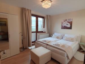 Posteľ alebo postele v izbe v ubytovaní Apartman RYSY D4