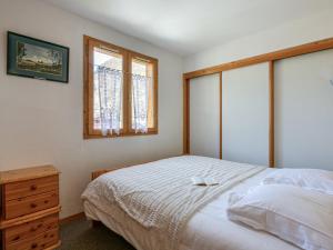 Katil atau katil-katil dalam bilik di Appartement Val-d'Isère, 3 pièces, 6 personnes - FR-1-694-29