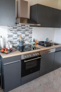 Kuchyň nebo kuchyňský kout v ubytování Ferienwohnung Hertreiter in Dingolfing 110qm