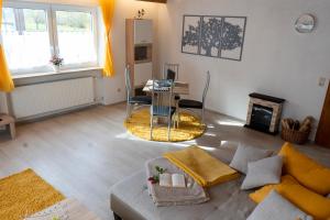 Posezení v ubytování Ferienwohnung Hertreiter in Dingolfing 110qm