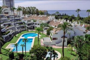 an aerial view of the resort and the ocean at Casa Birdie By Kura Homes in Marbella