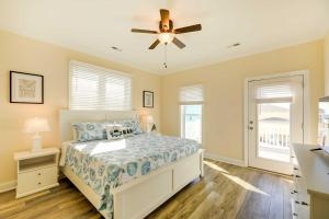a bedroom with a bed and a ceiling fan at Emerald Isle Vacation Home Walk to Beach! in Emerald Isle