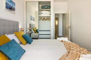 Postel nebo postele na pokoji v ubytování Casa Homem do Mar
