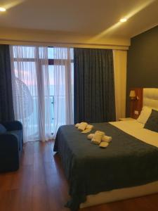 Letto o letti in una camera di The Fresh Wave hotel