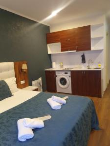 Letto o letti in una camera di The Fresh Wave hotel