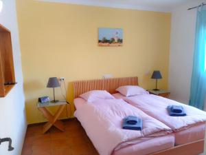 Ένα ή περισσότερα κρεβάτια σε δωμάτιο στο Casa Caliente +9 φωτογραφίες