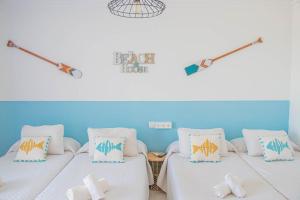 Postel nebo postele na pokoji v ubytování La Esperanza Beach- Zona Pubs y Restaurantes