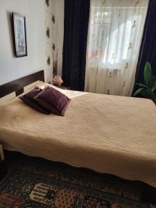 En eller flere senge i et værelse på Casa/camere Maria