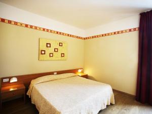 Voodi või voodid majutusasutuse Hotel Fortuna toas