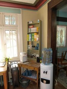 a kitchen with a counter and a table with a heater at Downtown Bed and Breakfast in Ottawa