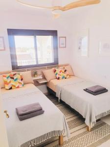 Posteľ alebo postele v izbe v ubytovaní Bellavista V Cabo Roig