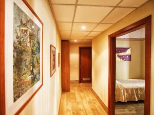 Voodi või voodid majutusasutuse Hotel Fortuna toas