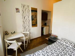 Ένα ή περισσότερα κρεβάτια σε δωμάτιο στο Historic Apartment