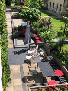 Vonkajšia záhrada v ubytovaní Hotel77