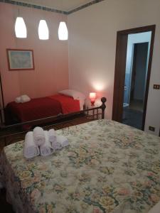 Posteľ alebo postele v izbe v ubytovaní Le Rocce Holiday Rooms