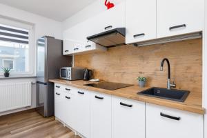 O bucătărie sau chicinetă la Coast Breeze Apartment by Renters