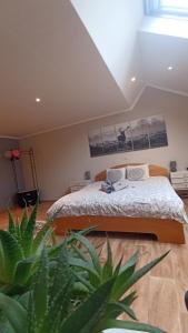Postel nebo postele na pokoji v ubytování Petites-Tailles - chambre d'hôtes