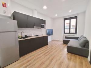 Kuchyň nebo kuchyňský kout v ubytování Apartamentos Margarita by gaiarooms + 37 fotografií