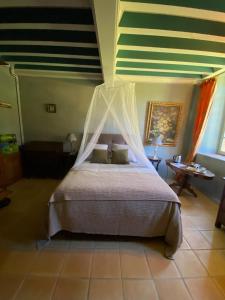 Katil atau katil-katil dalam bilik di Manoir du Bouyssou