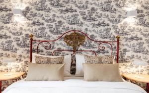 Cama ou camas em um quarto em Casa de S. Thiago de Obidos