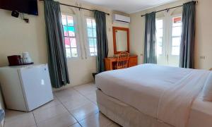 Seaview Beach Hotel客房内的一张或多张床位