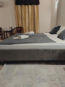 Una cama o camas en una habitación de Phorto Bella