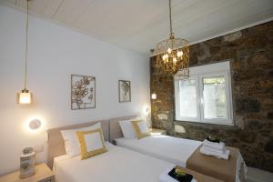 Posteľ alebo postele v izbe v ubytovaní TIFFANYS VILLAS + 37 fotografií