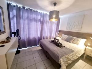 Postel nebo postele na pokoji v ubytování Luxury Apartamento Luz de Mar Complejo Playa Roca