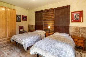 Posteľ alebo postele v izbe v ubytovaní Can Salvà Casa rural en magnífico entorno natural