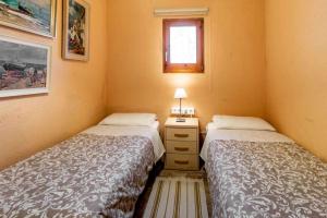 Posteľ alebo postele v izbe v ubytovaní Can Salvà Casa rural en magnífico entorno natural