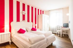 Postel nebo postele na pokoji v ubytování Hotel Speranza