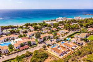 an aerial view of a resort with the ocean at Villa Santo Tomas by Villa Plus in Santo Tomás